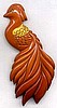 BP155 lg butterscotch bakelite peacock pin